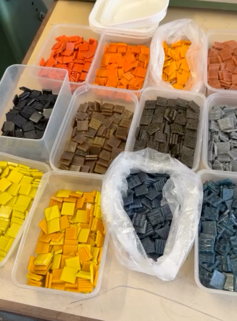 Buckets of square tiles of different colours
